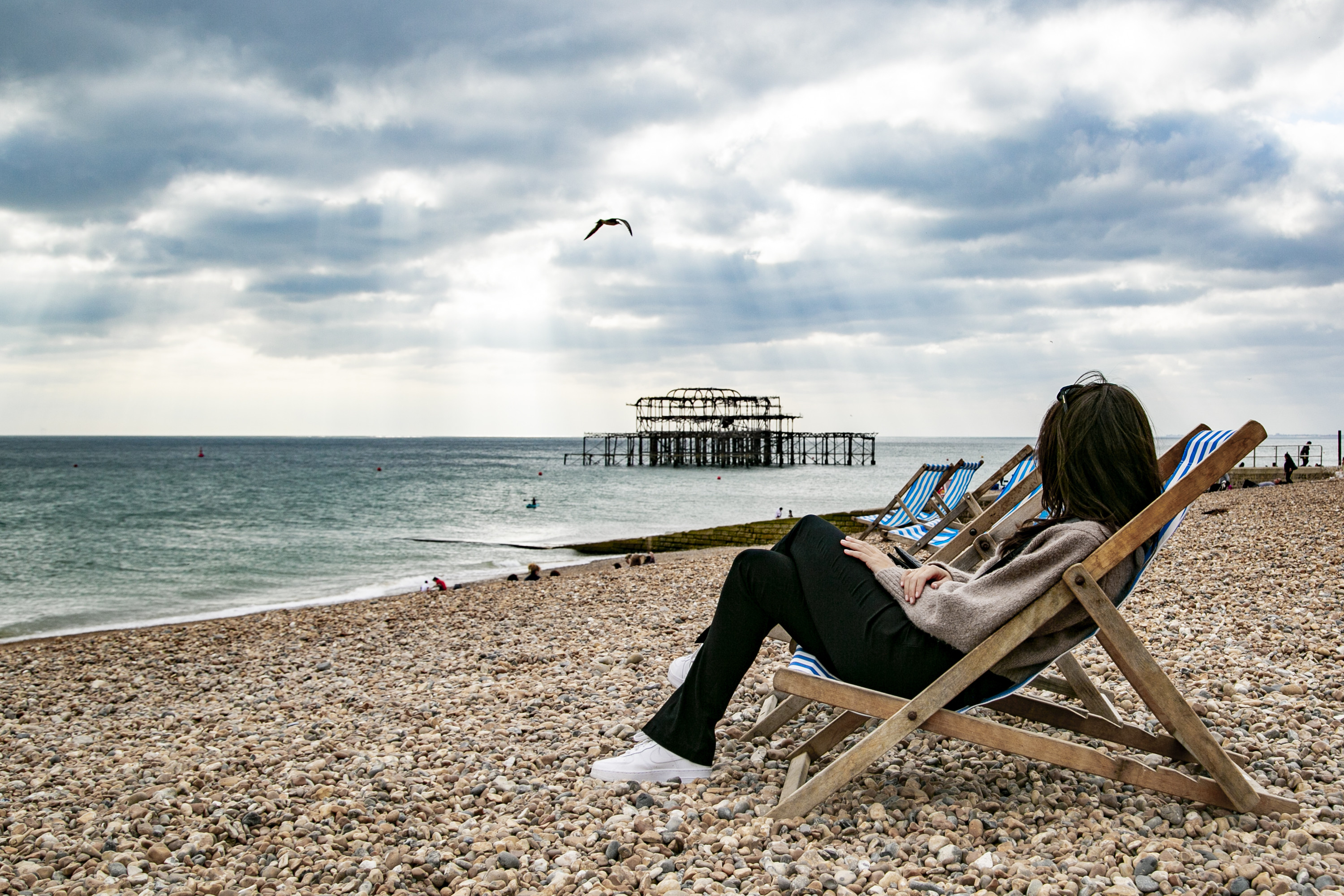 Brighton Sea Front, woman in deck chair